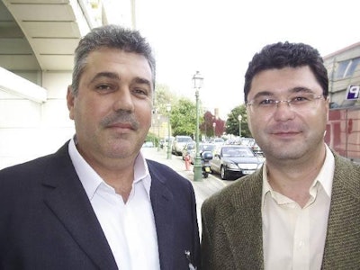 Constantin Toporiste (at left) of Nordic Petfood Group in Romania is pictured with Catalin Tudorache, sales chief of Kemin's Romanian dealer Profeed.