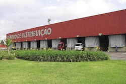 Total's headquarters includes a large distribution center where trucks back into bays lining the back wall of the company warehouse. Once products go to the other side of that wall (to the docks), they are considered the customer's property.