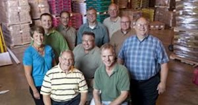 A whole posse of people from Tuffy's Pet Foods crammed into one photo, including Ken Nelson, president; Charlie Nelson, vice president of sales; Jim Farrell, national sales manager; Paula Sucher, sales coordinator; Chuck Orvik, product specialist, Nutrisource; and others.
