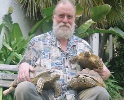 Dr. David Dzanis with his three sulcata tortoises, Lucky, Bucky and Stucky, from whom he has learned valuable lessons about feeding more traditional pets.