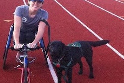 Kerri Morgan, 2012 Paralympian and bronze medalist, and her public access dog Twix. Morgan will give the opening keynote for Petfood Forum 2013.