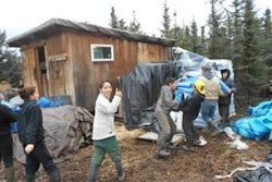 Program youths move a shipment of Annamaet Petfood.