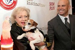 White and Uggie, her dog, attended the roast, sponsored by Instinct petfood brand.