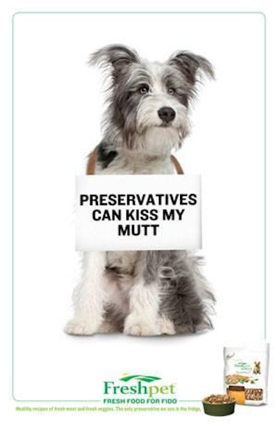 Freshpet's new ads feature a variety of dogs, like this mutt, with signs that play off their breed.