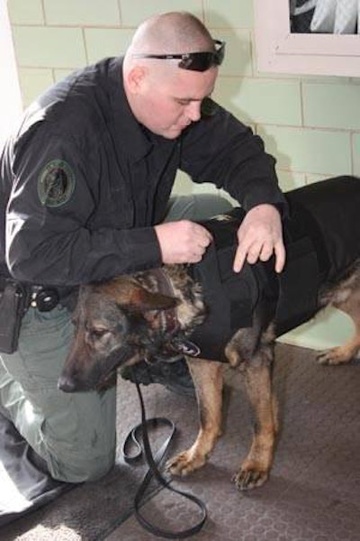 Deputy Justin Biggs' German Shepherd, Boss, received a Kevlar vest donated by Trouw.