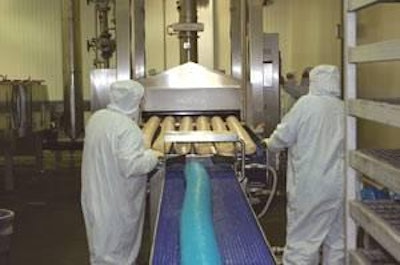 Oil browning of logs can kill surface bacteria prior to slicing.