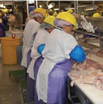 Ergonomic teams help reduce injury rates for employees performing repetitive tasks like breast trimming.
