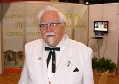 El impersonador del Coronel Sanders en el estand de Alltech