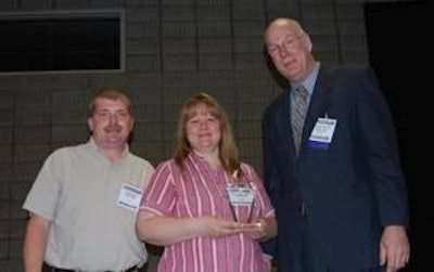 Glenn and Tracey Backes, Backes Farm, with Steve Willardsen, chairman USPOULTRY