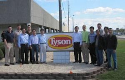 Charles Calvert (far left) and Biao Chen, Cobb China sales manager (far right) stand with senior representatives from Beijing Poultry Breeding Co., Dalian Kailong Food Industry Co., Yonghong Husbandry Co., Liaoning Yinong Animal Husbandry Co., Anhui Hewei Agricultural Development Co. and Hubei Tongxing Agriculture Co.