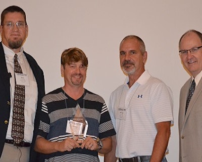 The USPOULTRY Clean Water Award winner in the full treatment category was Koch Foods of Gadsden, Alabama, with Michael Dean, wastewater manager, and Michael Ford, refrigeration manager, accepting the award from Brian Kiepper, left, selection committee member, and John Starkey, right, president of USPOULTRY.
