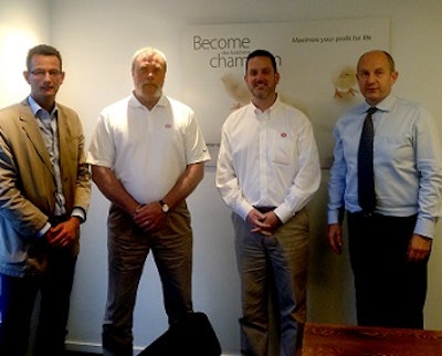 Andr&eacute; van Rij, Petersime area sales manager; Dave Juenger, Cobb director of global support services; Ben Green, Cobb director of hatcheries; and Michel De Clercq, Petersime managing director, commemorate a new partnership between Cobb and Hubei Tong Xing Agriculture Co., using Petersime's services.