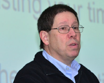 David Shapiro, DVM, director of veterinary services at Perdue Farms, speaks at the Biosecurity: Revisiting the Basics and Implementing New Strategies program held during the 2014 International Production & Processing Expo.