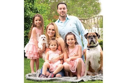 Courtesy Health Extension Pet Care | Health Extension Pet Care Chief Operating Officer Brad Gruber, here with wife Alexis, daughters Kyla, Laila and Briella, and dogs Buttons and Otis, says the companyâ??s focus on quality extends to all facets of its business.