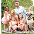 Courtesy Health Extension Pet Care | Health Extension Pet Care Chief Operating Officer Brad Gruber, here with wife Alexis, daughters Kyla, Laila and Briella, and dogs Buttons and Otis, says the companyâ??s focus on quality extends to all facets of its business.