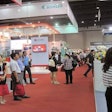Photo courtesy of Victam International B.V. | Attendees at FIAAP/VICTAM/GRAPAS Asia 2014 explore the show floor.