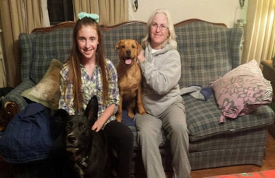 Purina Pro Plan 9 of 9 winner Laurie Neilson, her daughter, and dogs Ronnie and Mocha. | Courtesy Purina
