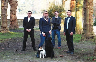 Founder and owner Jerry Xu, COO Jing Xu (not pictured), marketing specialist Paul Falla, supply specialist Bastian Thomann and sales specialist Tanja Huelsken are aiming to build a dominant presence in Europe’s specialty market. Also pictured: Labrador Retriever Savage Run Kieron and Forst-Parson Russell Terrier Lily vom Spanger. | Courtesy Vigor & Sage