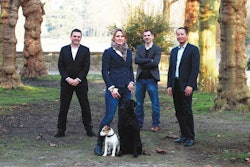 Founder and owner Jerry Xu, COO Jing Xu (not pictured), marketing specialist Paul Falla, supply specialist Bastian Thomann and sales specialist Tanja Huelsken are aiming to build a dominant presence in Europe’s specialty market. Also pictured: Labrador Retriever Savage Run Kieron and Forst-Parson Russell Terrier Lily vom Spanger. | Courtesy Vigor & Sage