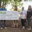 Matt Basler (left) of the Beneful team presents Secretary of the Board of Directors of the Frenchtown Dog Park Association Sarah Gartland (right) with a $7,500 donation to further park improvements at the dog park near downtown St. Louis. | courtesy Purina Beneful