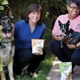 Linda Kramer, CEO of Daybreak, hopes to continue the success of Lindy and Company to the benefit of people like Ariel, a program alumna, while providing gourmet treats to pets like German Shepherd Tango and Boston Terrier Mattie. | Sharon Elaine Photography