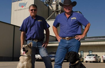 Mid America Pet Food then CEO Scott Glover and President Antoine Albin (here in 2016 with Timber Wolf/Malamute Locke and Labrador Retriever Zip) started the company in 2006, and spent the intervening years making their mark in the premium pet food market. | Mid America Pet Food
