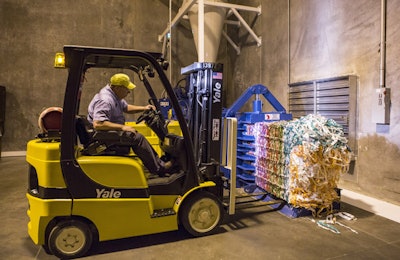 A Purina employee in Oklahoma City prepares discarded packaging materials for recycling. | photo courtesy Purina