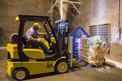 A Purina employee in Oklahoma City prepares discarded packaging materials for recycling. | photo courtesy Purina