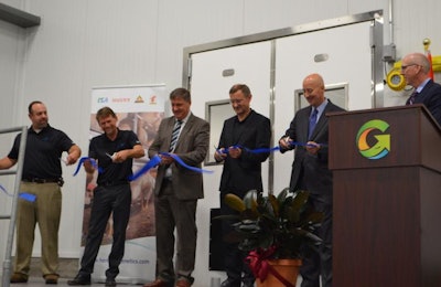 Officials cut the ribbon at the grand opening of Hendrix Genetics' new hatchery in Grand Island, Nebraska. Pictured, from left, are Doug Metzler, Hendrix Genetics general manager; Peter Mumm, Hendrix Genetics director of business development; Antoon Van Den Berg, Hendrix Genetics CEO; Serve Hermans, managing director of Hendrix Genetics Layers; Nebraska Gov. Pete Ricketts; and Dave Taylor, President of the Grand Island Economic Development Corp. | Photo courtesy of Hendrix Genetics