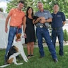 Best Breed Vice President Levi Wittenmyer, Dr. Toni Cotton, DVM, Founder Dr. Gary Cotton, DVM, and President Kent Benson, here with American Foxhound mix Walter and black cat Barney, focus on natural and holistic formulations to provide the best nutrition available to pets. | Courtesy Best Breed