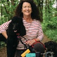 Portland Pet Food Founder and president Kate McCarron, here with her Standard Poodle Winnie and her Lasapoo Tuxedo, founded the company after another of her Standard Poodles, Rosie, had trouble eating traditional pet food due to health issues in her old age (14 years). A new company was born and Rosie lived to be 16.5 years old. | Photo by Henry Cromett