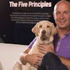 Since becoming regional president of Pet Nutrition North America, Mars Petcare, Mark Johnson (shown with Hoover, the dog of a Mars associate) has focused on connecting with consumers and retail customers. l Courtesy of Mars Petcare