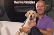 Since becoming regional president of Pet Nutrition North America, Mars Petcare, Mark Johnson (shown with Hoover, the dog of a Mars associate) has focused on connecting with consumers and retail customers. l Courtesy of Mars Petcare