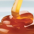 Caramel as a coloring is a sugar that has been heated to “caramelize” and develop various shades of brown. | © Luchschen, Dreamstime