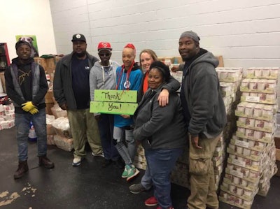 Photo by Perfection Pet Foods | Fulton County Animal Shelter employees and the donated product from Perfection Pet Foods.