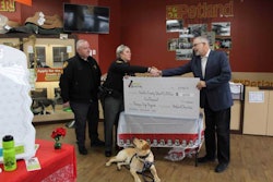 Photo by Petland Charities | From left to right, Franklin County Sergeant Jason Ratliff, Deputy Darrah Metz (Mattis handler), therapy dog Mattis and Petland Charities Director Ed Sayres.
