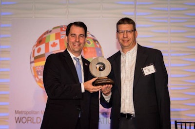 Lanny Viegut, Carnivore Meat Company CEO and owner, accepts the 2018 Export Achievement Award from Governor Scott Walker. | Photo courtesy of Carnivore Meat Company