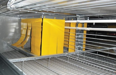 Only cages equipped with a nest, perches and a scratching area are allowed in the European Union. | Vincent Guyonnet