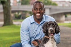 Targeted Pet Treats President Gregory Austin, here with white Maltese Poodle mix (Maltipoo) Jeffrey and Australian Shepard Poodle mix (Aussie Doodle) Jackson, credits his team and his company’s ability to stay on top of trends with TPT’s triple-digit sales growth and overall success. | Photo courtesy Targeted Pet Treats