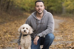 Brad Gruber, president and COO of Health Extension Pet Care, here with his Mini Goldendoodle Blaze, says that partnerships with their retailers and constant improvement have been vital to Health Extension’s success. | Photo courtesy Health Extension Pet Care