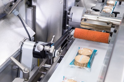 Bosch Sigpack flow wrapping machine and topload cartoner