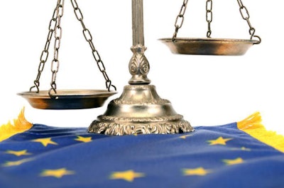 Scales of justice and Flag of European union European union law concept.