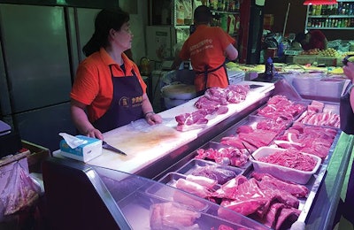 Pork may be the meat of choice for many Asian consumers, but now is the time to market the benefits of chicken meat and eggs. (Vincent Guyonnet)