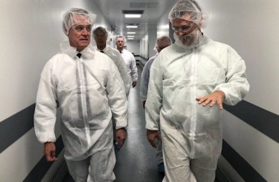 U.S. Sen. David Perdue, left, visits Boehringer Ingelheim’s site in Athens, Georgia, which recently expanded its capacity to produce vaccines. (Boehringer Ingelheim)