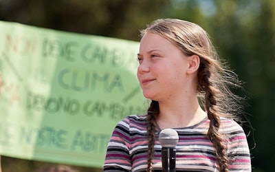 ROME, ITALY - April 19, 2019: Swedish climate activist Greta Thunberg attending Fridays For Future (School Strike for Climate) protest in front of a crowd near the Colosseum. (Daniele Cossu | Bigstock.com)
