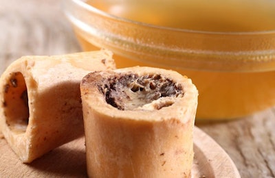 Bone broth has a long history of potential health claims, but the actual research of those claims in pet food is lacking. (Magdalena Kucova | Shutterstock.com)