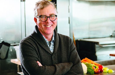 Shawn Buckley, seen here in one of JustFoodForDogs’ accessible-to-the-public kitchens, wanted to found a company focused on creating fresh dog food formulations using whole food ingredients and an eye to lifelong health and nutrition. | (Courtesy JustFoodForDogs)