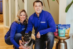 Finley’s Barkery co-founders Angie and Kyle Gallus, here with company namesake Finley the Pocket German Shepherd mix, are former special education teachers on a mission to grow inclusivity with the help of their dog treats. | (Courtesy Finley’s Barkery)