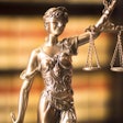 Legal office of lawyers and attorneys legal bronze model statue of Themis goddess of justice.