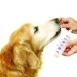 The last year has given a boost to the pet supplement market, as pet owners are zeroed in on their own health and that of their pets. | Ellen Coleman I Shutterstock.com